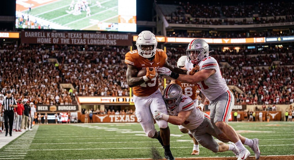 Texas and Ohio State football teams playing in Austin
